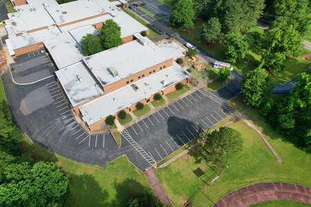 Adamson Middle School Parking Lot - Main in Rex