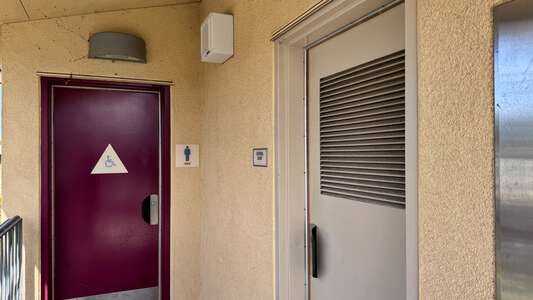 Creative Performing Media Arts Men's Restroom in San Diego