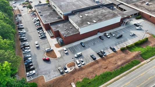 Parking Lot - Rear to Theater Lot
