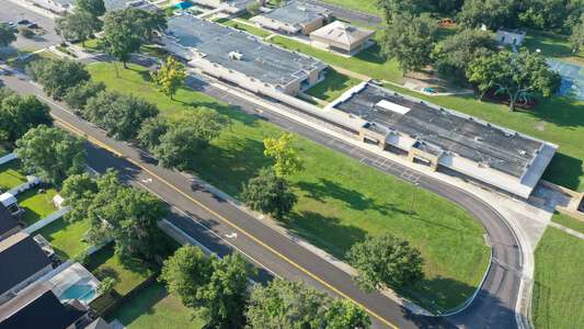 Lake Myrtle Elementary School Parking Lot - Bus in Land O' Lakes