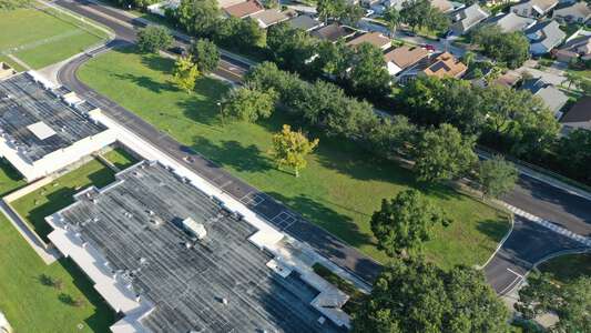 Lake Myrtle Elementary School Parking Lot - Bus in Land O' Lakes