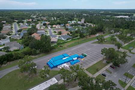 River Ridge High School Parking Lot - Bus in New Port Richey