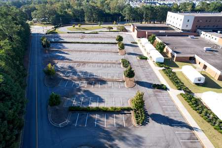 Lanier High School Parking Lot - West in Sugar Hill