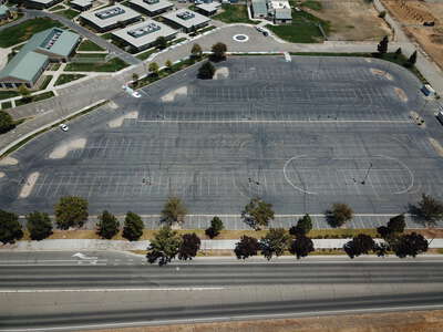 Pioneer High School Parking Lot - Student in Woodland