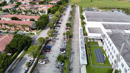 Ronald W. Reagan/Doral Senior High School Parking Lot - Staff in Doral