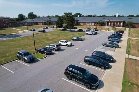 Olympia Learning Center Parking Lot - Front in Columbia