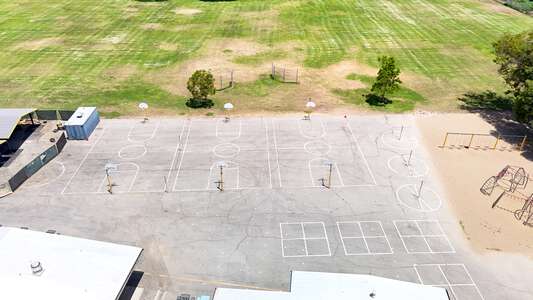 Jordan Academy of Language and Computer Science Outdoor Basketball Courts in Orange
