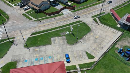 Woodmere School Parking Lot - Front in Harvey 2