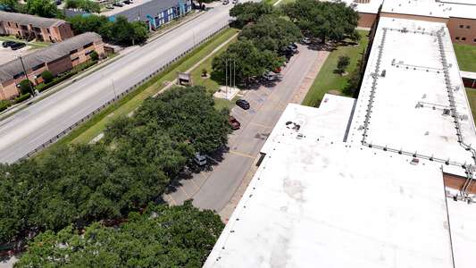 MacArthur High School Parking Lot - Front in Houston