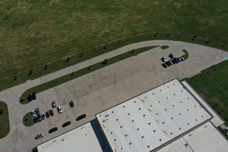 Coppell Middle School West Parking Lot - Back - CMSW in Dallas