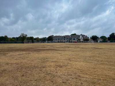 Raul Quintanilla Sr Middle School STEAM Academy Natural Grass Soccer Field in Dallas