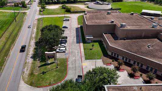 MacArthur Ninth Grade School Parking Lot - Front in Houston