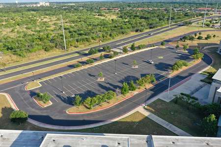 Round Rock High School Parking Lot - 1200 Main Bldg in Round Rock